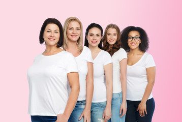 Fototapeta premium group of happy different women in white t-shirts