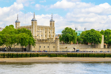Sunny day at the Tower of London, seen from the River Thames