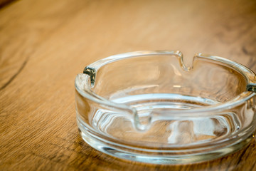 empty ashtray on a wood table