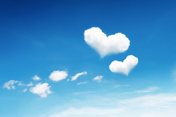 Naklejka na ściany i meble two heart clouds on blue sky