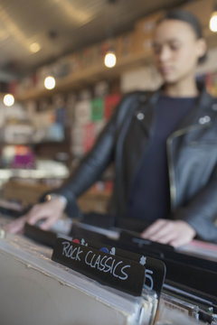 Young woman in a record store.