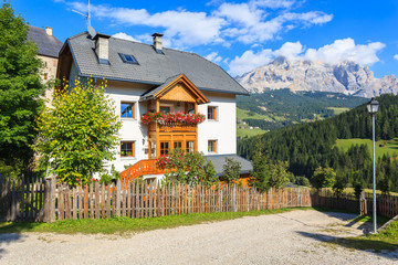 Alpine house in La Villa village in Dolomites Mountains, italy