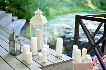 wedding candles near lake
