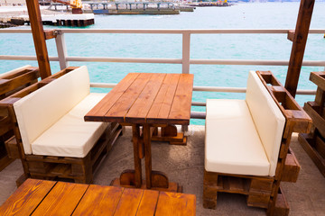 free table on the beach in a cafe