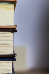 a stack of books  shallow depth of field