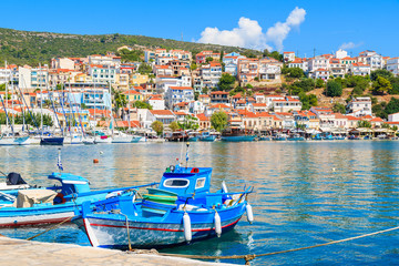 Traditional blue and white colour Greek fishing boats in Pythagorion port, Samos island, Greece