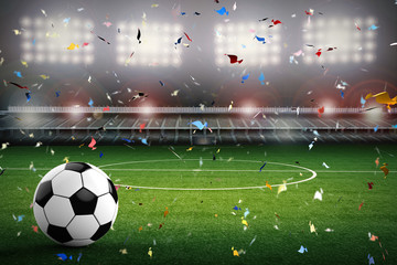 soccer ball with soccer stadium and confetti background © phonlamaiphoto