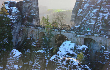 Stone bridge in winter Bastei