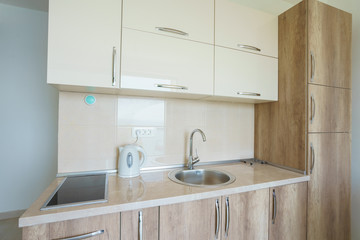 Interior of a guest house room with kitchen