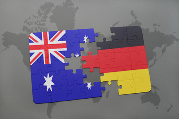 puzzle with the national flag of australia and germany on a world map background.