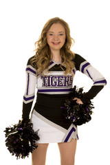 teen cheerleader with big smile pom