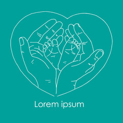 Cute little feet of newborn baby in mother's hands.