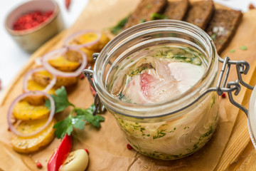 herring salad with vegetables on desk top view potato onion