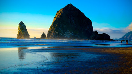 Cannon Beach sunset and famous Haystack Rock.  Oregon, USA.