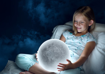 Girl in her bed and moon planet
