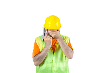failure sadness guilty manuel worker regretful gun in hand isolated on white portrait