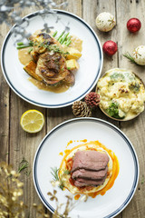 Baked chicken and beef with lemon and rosemary