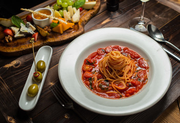 pasta seafood in tomato sauce with shrimp and tomatoes