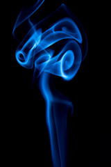 Blue smoke flower on black background