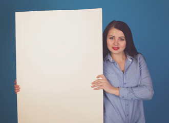 Woman in blue and canvas