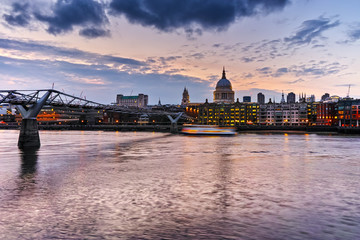Night photo of St Paul's Cathedral and Millennium Footbridge over the Thames, London, England, Great Britain