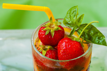 Summer strawberry beverage with fresh berries
