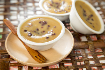 Traditional chinese cupcake of black beans on the table in restaurant