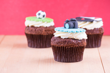 Delicious cupcakes on table