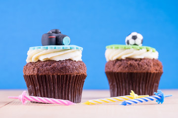 Delicious cupcakes on table