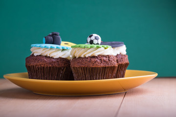 Delicious cupcakes on table