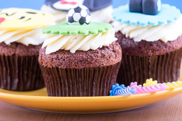 Delicious cupcakes on table