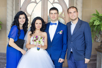 Newlyweds with friends