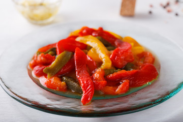 Salad of sweet, colored ,baked pepper.Garlic sauce.selective focus