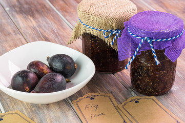 Fresh homemade fig jam in glass jars.