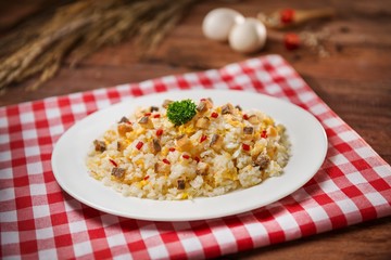 Plate of fried rice on the table in restaurant
