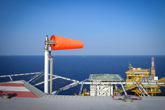 The wind sock is set on the oil rig to showing wind direction fo
