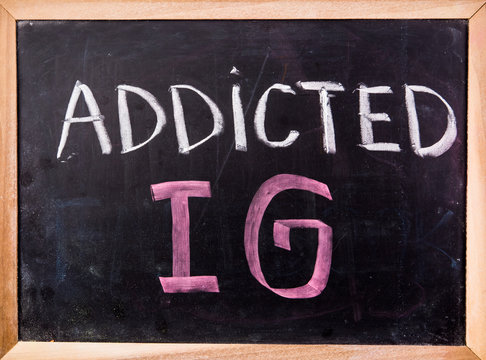addicted IG word on blackboard