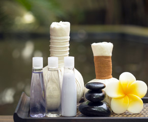 Fototapeta na wymiar Spa massage compress balls, herbal ball with salt, turmeric and aroma, Thailand, select focus 