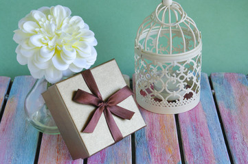 Gift box on vintage wooden board
