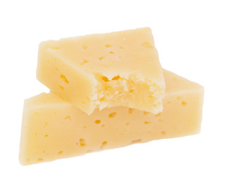 yellow solid cheese pieces on the white background