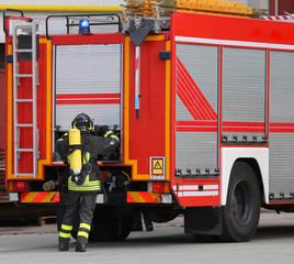 Firefighter during a training exercise with the oxygen cylinder