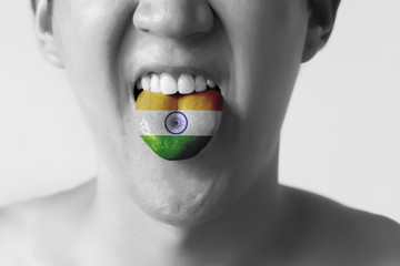 India flag painted in tongue of a man - indicating Hindi or Tamil language and speaking
