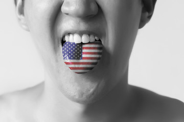 USA or United States flag painted in tongue of a man