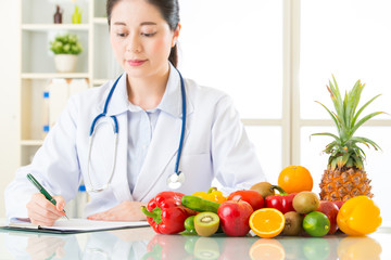 Doctor nutritionist with fruits and vegetable