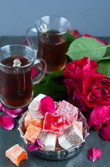 glass of Turkish tea and rahat Delight