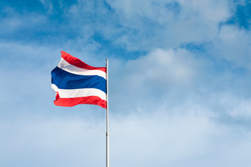 Flag of Thailand with blue sky