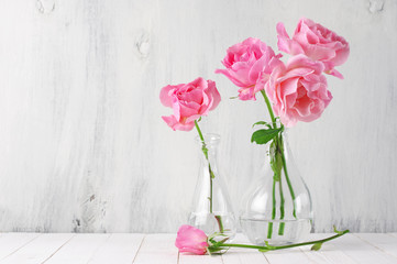 Pink roses in vases