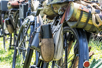 Close up photo of old military bicycle with kitbag and equipment