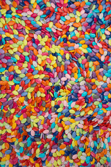 Fototapeta na wymiar Multicolor bonbon sweets (ball candies or chocolate dragees) on background