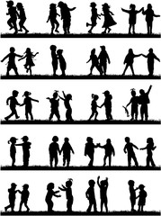 Silhouettes of children playing. Large group.